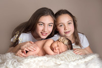 Golden girls, stunning simple newborn baby girl and sisters, Suffolk and Essex newborn baby photographer.