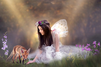 Cute little animal fairy, outdoor photoshoot of a fairy girl and a fox, Essex and Suffolk fairy photography, child photographer.